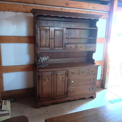 DINING ROOM HUTCH WITH AN ABUNDANCE OF STORAGE AND 12 STEMMED GLASSES