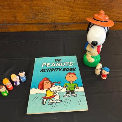 The Peanuts Vintage Figurines and an Activity Book