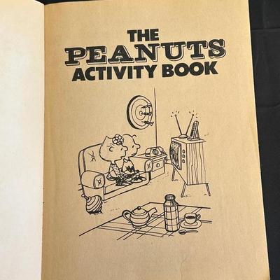 The Peanuts Vintage Figurines and an Activity Book