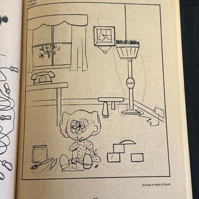 The Peanuts Vintage Figurines and an Activity Book