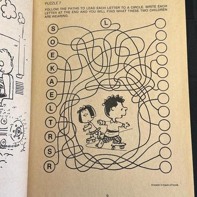 The Peanuts Vintage Figurines and an Activity Book