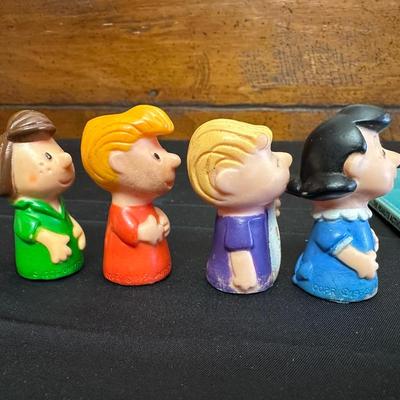 The Peanuts Vintage Figurines and an Activity Book