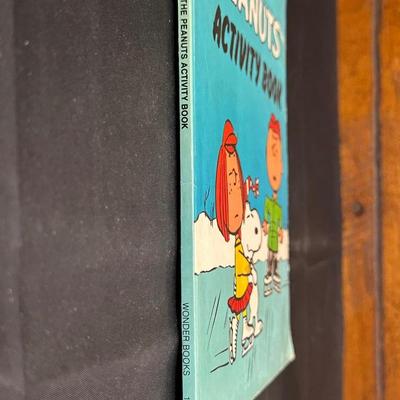 The Peanuts Vintage Figurines and an Activity Book