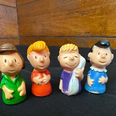 The Peanuts Vintage Figurines and an Activity Book