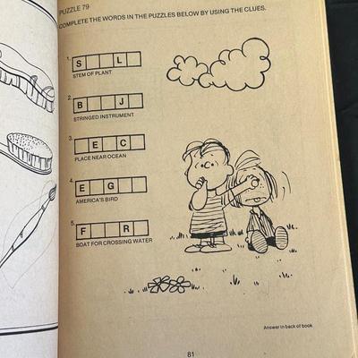 The Peanuts Vintage Figurines and an Activity Book