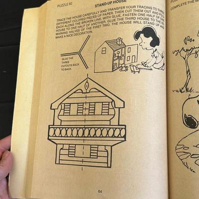 The Peanuts Vintage Figurines and an Activity Book