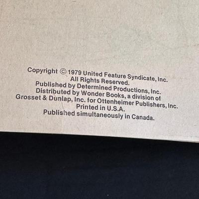 The Peanuts Vintage Figurines and an Activity Book