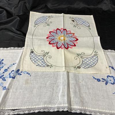 Lot of Vintage Colorful embroidered linens. Including dresser scarves