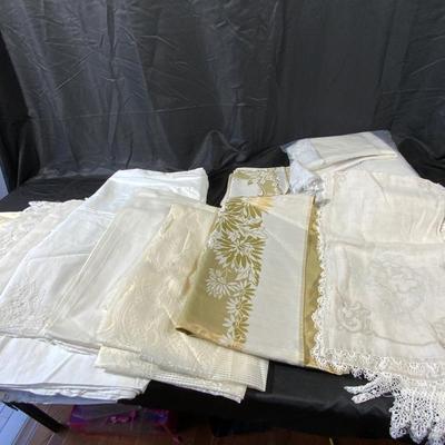 Lot of Vintage to Now tablecloths including table runners