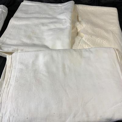Lot of Vintage to Now tablecloths including table runners
