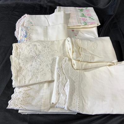 Lot of 8 Vintage Pillow Cases including some with embroidery.