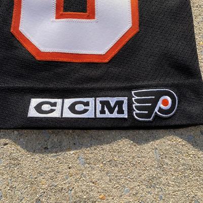 LOT 260 B: NHL Philadelphia Flyers John Leclair #10 CCM Jersey Size Junior Small / Medium & Starter Button Up T-Shirt Size Large