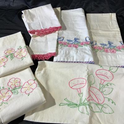 Lot of Vintage pillowcases, including a set with pink lace.