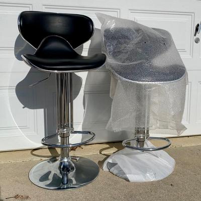 LOT 277 A: 2 Black Faux Leather Spinning Adjustable Bar Stools