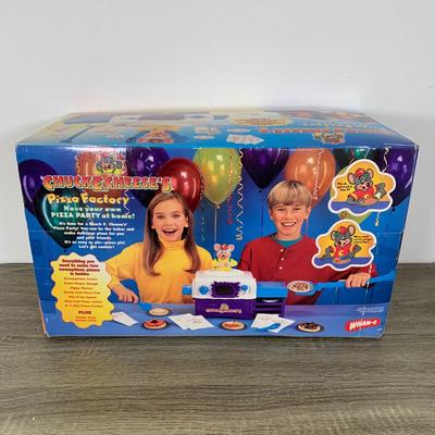 LOT 278 A: NIP 1999 Wham-O Chuck E. Cheese's Pizza Factory