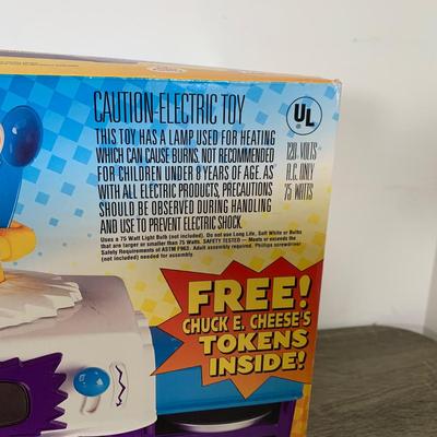 LOT 278 A: NIP 1999 Wham-O Chuck E. Cheese's Pizza Factory