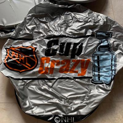 LOT 280 B: NHL Philadelphia Flyers Appreciation Collection: Signs, Pennants, & 2 1999 Inflatable "Cup Crazy" Stanley Cups