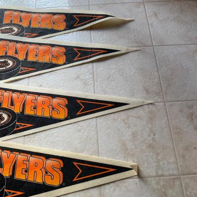 LOT 280 B: NHL Philadelphia Flyers Appreciation Collection: Signs, Pennants, & 2 1999 Inflatable "Cup Crazy" Stanley Cups