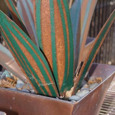 GROUPING OF SCULPTURES OF METAL AGAVe PLANTS IN COPPER POTS