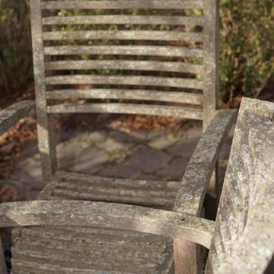 Sale Photo Thumbnail #431: this table is in four sections for ease of moving .
four chairs 
it is weathered but sturdy. No broken wood
It will need to be scrubbed and sanded 
I do believe this could be teak wood, 
The tin candle lantern comes with!