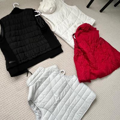 Lot 146 4 Women's vests -black, grey, white, red (2 L and 2 XL)