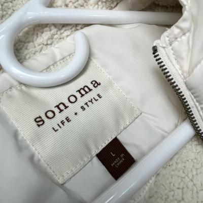 Lot 146 4 Women's vests -black, grey, white, red (2 L and 2 XL)