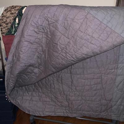 Vintage quilt approximately 52” x 84”.