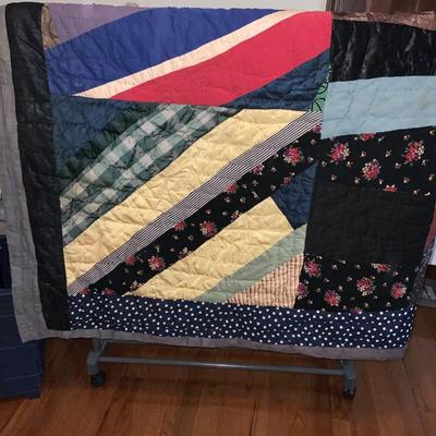 Vintage quilt approximately 52” x 84”.