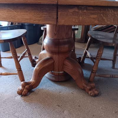 RUSTIC ANTIQUE PEDESTAL TABLE WITH LION PAW FEET AND 4 CHAIRS