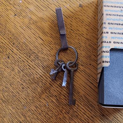 2 POCKET KNIVES, SHARPENING STONE, OLD KEYS AND A WOODEN HANDLE AWL