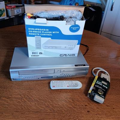 SYLVANIA COMBO VHS/DVD PLAYER AND LIKE NEW DVD PLAYER