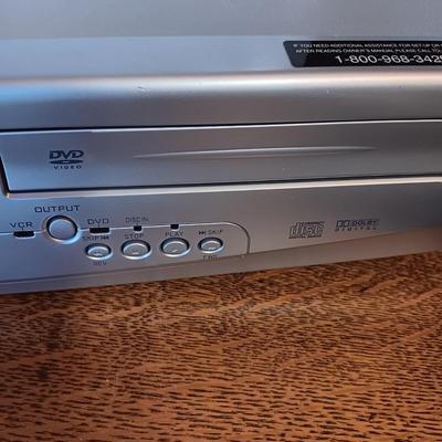 SYLVANIA COMBO VHS/DVD PLAYER AND LIKE NEW DVD PLAYER
