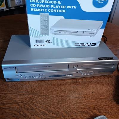 SYLVANIA COMBO VHS/DVD PLAYER AND LIKE NEW DVD PLAYER