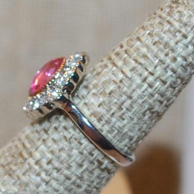 Size 5 Oval Translucent Red Stone Ring with Full Surround on a Silver Tone Band (3.4g)
