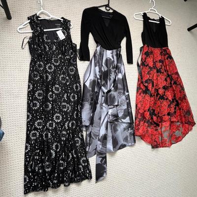 Lot 157 3 dresses black and grey (6), red and black (6), black floral (8)