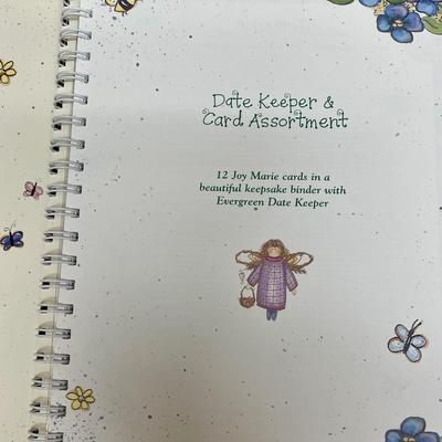 Lot of Greeting Card Planner Books with cards inside.
