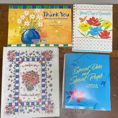 Lot of Greeting Card Planner Books with cards inside.