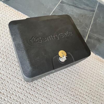 Lot 176 Sentry fireproof safe lockbox (with key)
