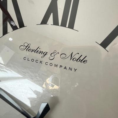 Lot 177 Sterling and Noble Wall clock
