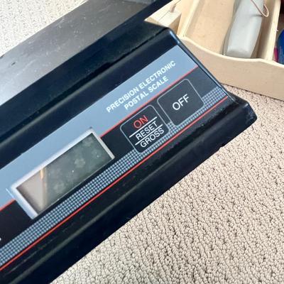 Lot 182 briefcase, office tray with postage scale, staplers, miscellaneous