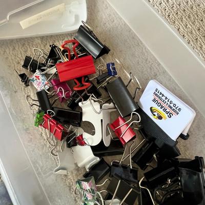 Lot 184 3 plastic storage bins of office supplies - pens, binder clips, command strips