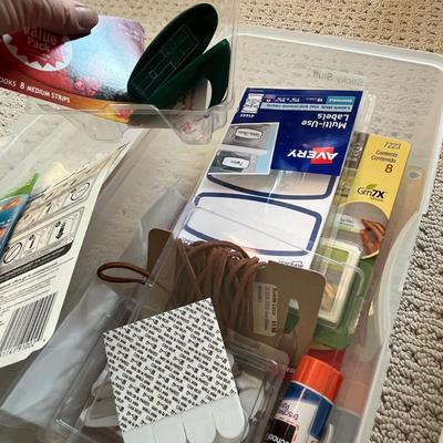 Lot 185 3 plastic bins of labels, glue and sticker labels and numerous exacto knives