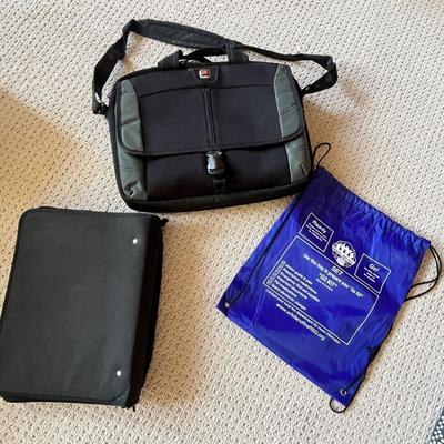 Lot 191 Computer bag, string backback, and binder