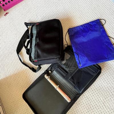 Lot 191 Computer bag, string backback, and binder