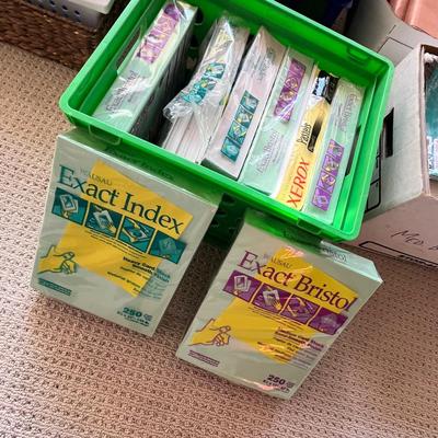 Lot 195 plastic milk crate with 8 reams of colored printer paper and cardstock