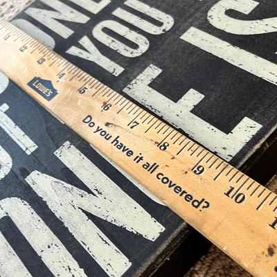 Lot 201 You only live once sign and Broncos pillow