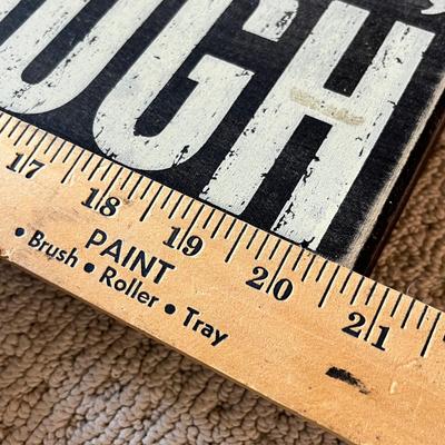 Lot 201 You only live once sign and Broncos pillow