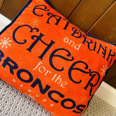 Lot 201 You only live once sign and Broncos pillow