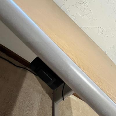 Lot 217 Sit / Stand desk in the office