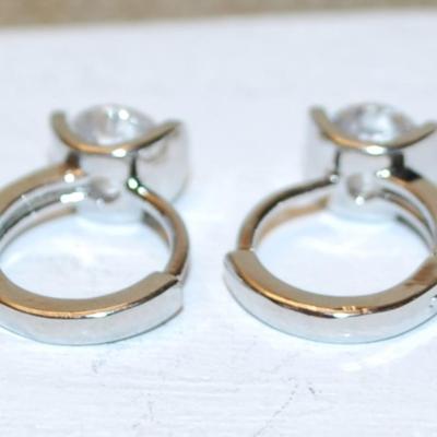 Single Clear Diamond-Like Stone Earrings Set on a Latch Back